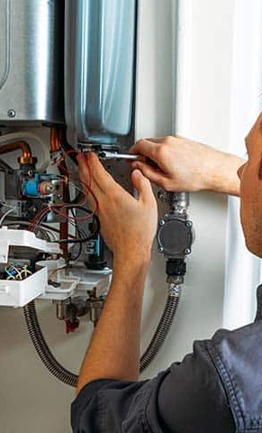 Person working on a electrical system